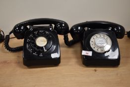 Two vintage rotary dial telephones, having been converted to modern wiring.