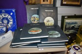 Ten leather bound volumes of 'The Epic of Flight' by Time-Life Books