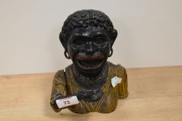 A cast metal mechanical 'Dinah' money box.