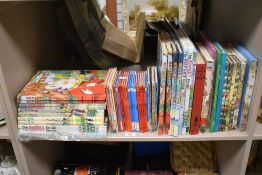 A selection of Rupert Annuals and books.