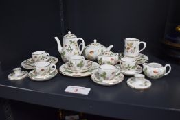 A miniature Wedgwood 'Wild Strawberry' tea set.