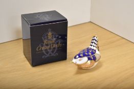 A Royal Crown Derby fine bone china Imari pattern 'Wren' paperweight, with gold coloured stopper