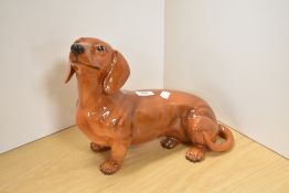 A Beswick Pottery fireside 'Dachshund' 2286 in tan gloss, designed by Albert Hallam
