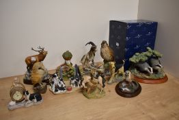 A group of three Border Fine Arts animal studies, comprising 'Red Stag 151' modelled by David Walton