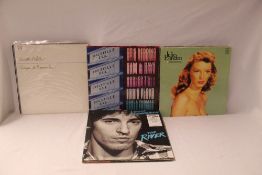 A lot of 25 various albums - as in photos - rock . Pop and more on offer here - ideal for online