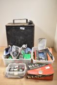 An assortment of vintage spark plugs, many in boxes, a bicycle lamp dynamo set and mirror, a jerry
