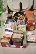 A variety of vintage games, including travelling chess, puzzle knots, card games , playing cards