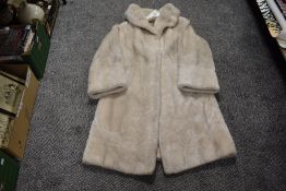 A vintage faux fur coat.