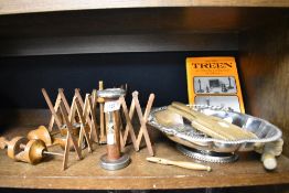 A selection of vintage treen, including biscuit press and pie wheel etc and a silver plated