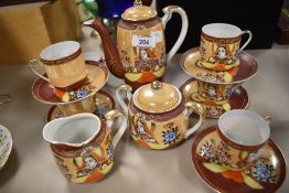 A Japanese egg shell tea set, comprising teapot, cups and saucers, milk and sugar.