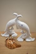 Two 20th Century continental pereira pottery peacock ornaments, measuring 24cm tall, and a