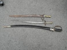 A French Chassepot 1868 Bayonet having French engraved inscription dated 1868, blade numbered 74992,