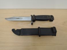 A USSR AKM Bayonet with scabbard, blade length 14cm, overall length 27cm