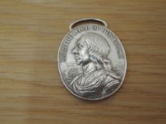 A 18th/19th century restike of the 1650 Dunbar Medal, bust of Cromwell looking left and legend The