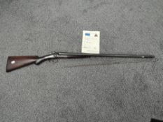 A Deactivated to EU Standard 12 Bore Double Barrelled Percussion Shot Gun, lock plate marked M.Wild,