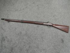 A Percussion Enfield Musket marked on lock plate & stock with a Crown & Enfield, no ramrod, barrel