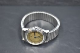 A gent's 1940's steel Omega wrist watch having wind up mechanism, Arabic numeral dial and subsidiary