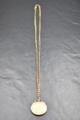 A 1912 sovereign pendant with 9ct gold surround marked .375 and curb-linked chain with sprung