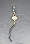 A lady's vintage 9ct gold Rolex wrist watch, case bearing no:203642281, having Arabic numeral dial