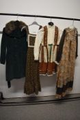 Three 1960s girls dresses and a green corduroy coat.