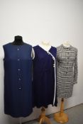 Three vintage 1960s dresses, including dog tooth mini dress.