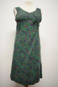 A highly collectable 1960s 'Dollyrockers' mini dress, having claret and purple floral pattern on
