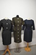 Three vintage 1960s day dresses, including thick wool striped dress with buttons and faux pockets to