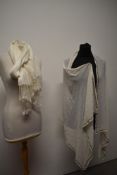A vintage white Tulle Bi Telli shawl and a cream scarf.