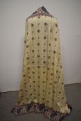 A mid Victorian cream silk shawl, having woven blue and red border and motifs, some wear, approx 47'