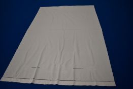 A large antique French dowry bed sheet, having raised floral embroidery and ladder work and