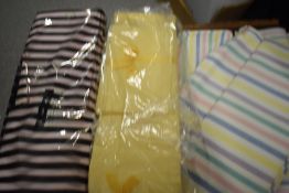 A selection of vintage striped sheets and pillow cases, a set of yellow sheets and pillow cases, a