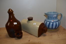 A Buchan Portobello jug having blue ground with repeating leaf like pattern, a stoneware hot water
