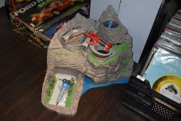 A Thunderbirds Tracy Island plastic playset with rockets