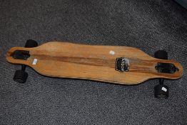An Arbor Collective Flagship skateboard, measuring 95cm long