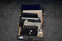A collection of vintage ladies purses and clutch bags