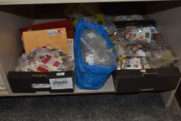 WORLD STAMPS IN 2 BOXES, PACKETS, STOCKBOOKS, LEAVES & A LOT MORE Box with a smaller one to top with