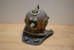 A copper and brass replica divers mask.
