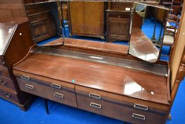 A vintage dressing table having gloss finish