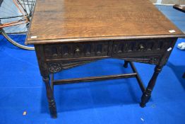 A traditional oak side table, refectory style
