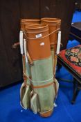 Three vintage golf bags