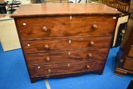 A Victorian mahogany mule style chest of drawers with lift lid over faux drawer and three lower