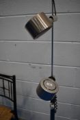 A vintage chrome standard lamp with dual spot fittings