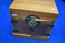 An Oriental jewellery or sewing box with lined interior