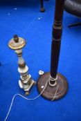 A traditional standard lamp and painted wood table lamp