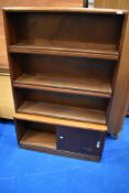 A vintage sapele Minty style four tier stacking bookcase