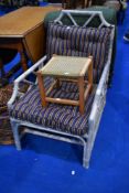 A conservatory chair and strung stool