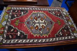 A traditional prayer rug, approx. 88 x 52cm
