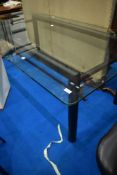 A modern glass dining table approx 210 x 100cm
