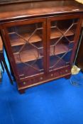A reproduction Regency mahogany low bookcase or display cabinet