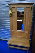 A bespoke golden oak hall stand having GWR stamped to coat hooks